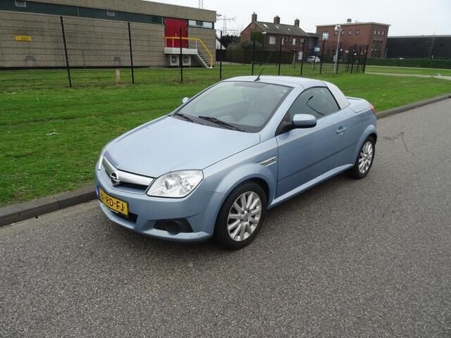 Blauw, metallic lak Gebruikt 2005 Opel Tigra Cosmo Cabriolet | € 1.895 (Goede deal) - Afbeelding 1/4