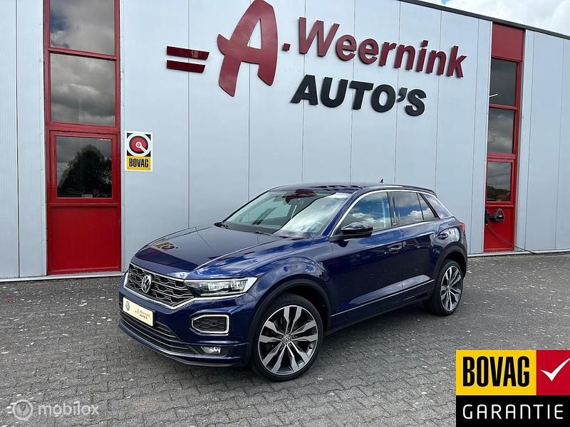 Blauw Gebruikt 2020 VW T-Roc Business SUV | € 24.750 (Eerlijke prijs) - Afbeelding 1/4
