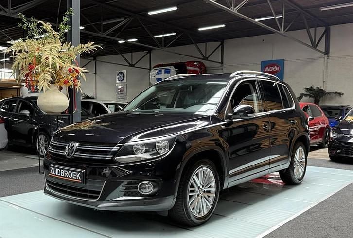 Zwart, metallic lak Gebruikt 2014 VW Tiguan Cup SUV | € 13.999 (Eerlijke prijs) - Afbeelding 1/4