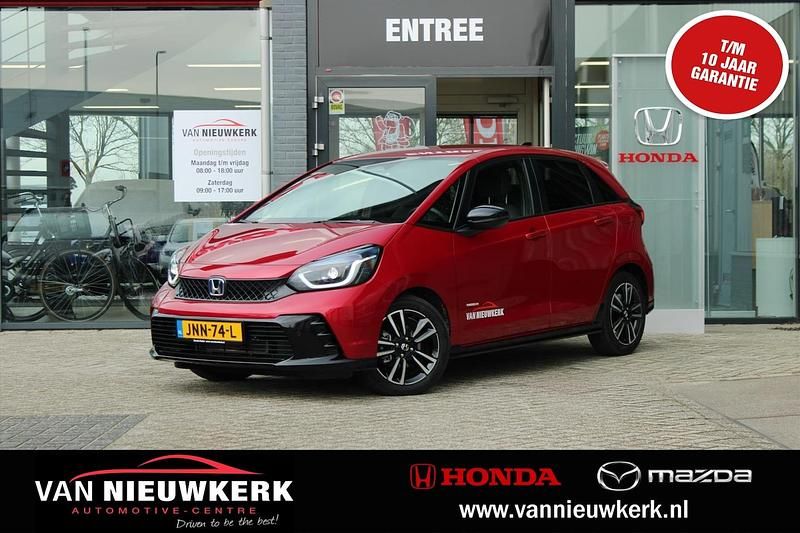 Rood (metallic) Nieuw 2025 Honda Jazz Advance Hatchback | € 31.390 (Eerlijke prijs) - Afbeelding 1/4