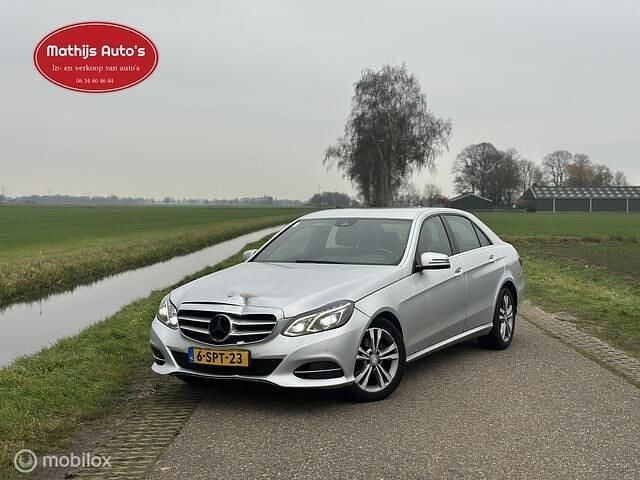 Grijs Gebruikt 2013 Mercedes E200 Avantgarde Sedan | € 7.250 (Super prijs) - Afbeelding 1/4