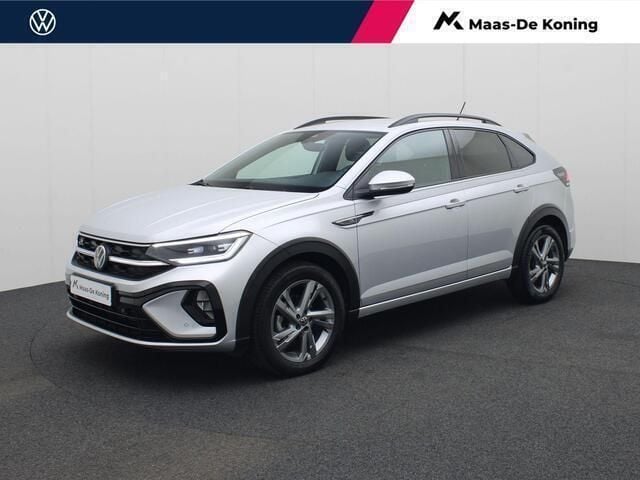 Grijs Gebruikt 2024 VW Taigo R-line SUV | € 28.440 (Eerlijke prijs) - Afbeelding 1/4
