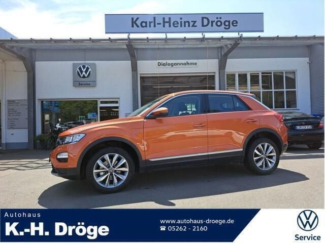 Oranje Gebruikt 2020 VW T-Roc Style SUV | € 24.392 (Eerlijke prijs) - Afbeelding 1/4