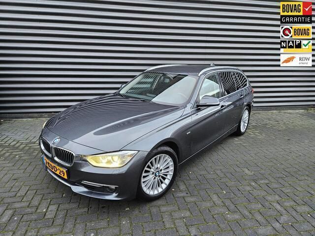 Grijs Gebruikt 2013 BMW 320 Executive Stationwagen | € 7.999 (Eerlijke prijs) - Afbeelding 1/4