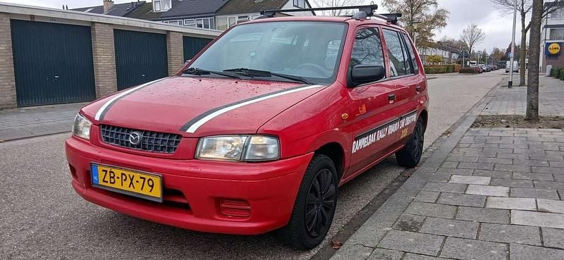 Rood Gebruikt 1999 Mazda Demio Hatchback | € 850 (Eerlijke prijs) - Afbeelding 1/4