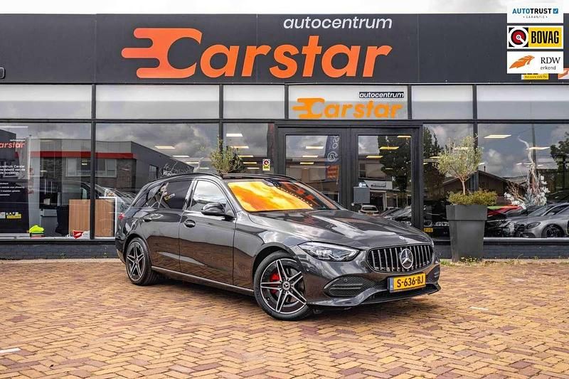 Grijs Gebruikt 2022 Mercedes C220 AMG line Stationwagen | € 37.950 (Eerlijke prijs) - Afbeelding 1/4