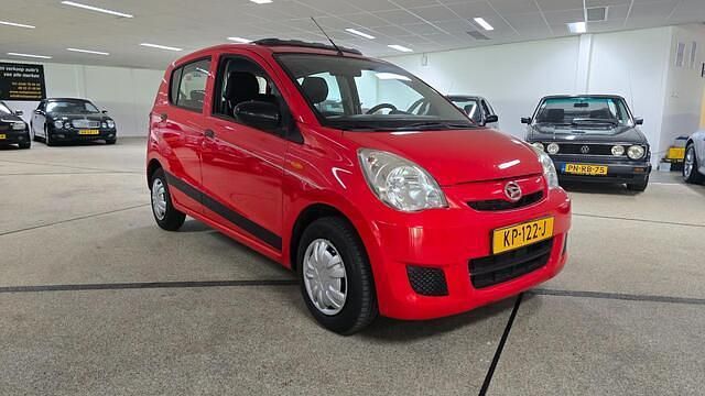 Occasion Daihatsu Cuore 69 PK (50 kW) 2008 Rood Hatchback