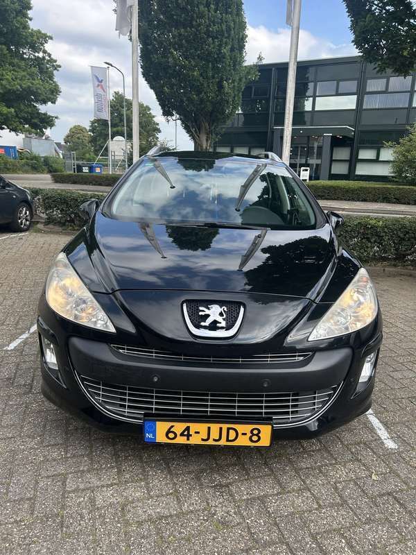 Zwart Gebruikt 2009 Peugeot 308 Stationwagen | € 5.000 - Afbeelding 1/4