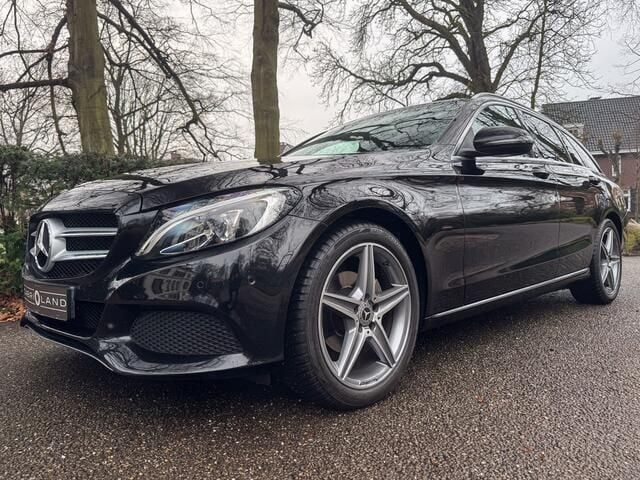 Zwart Gebruikt 2018 Mercedes C180 AMG Stationwagen | € 19.950 (Goede deal) - Afbeelding 1/3