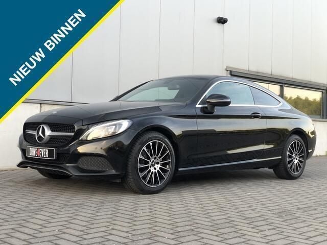 Zwart Gebruikt 2016 Mercedes C180 Prestige Coupé | € 21.995 (Eerlijke prijs) - Afbeelding 1/4
