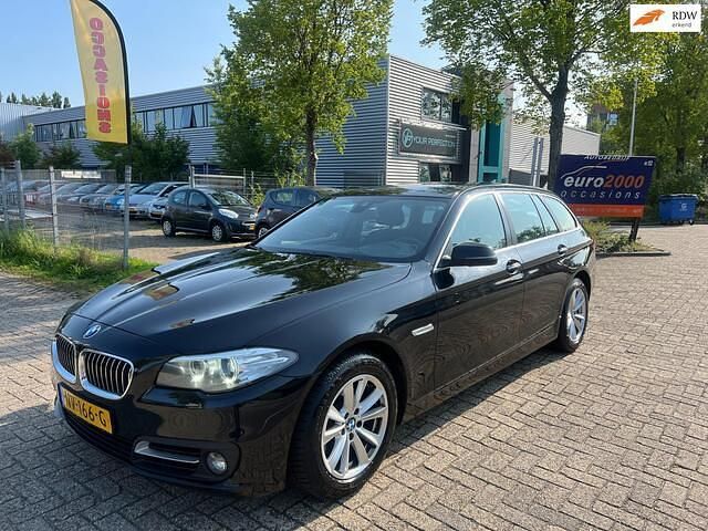 Zwart Gebruikt 2013 BMW 518 Luxury Line Stationwagen | € 6.750 - Afbeelding 1/4