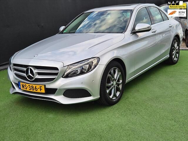 Grijs Gebruikt 2016 Mercedes C180 Prestige Sedan | € 19.990 (Eerlijke prijs) - Afbeelding 1/4