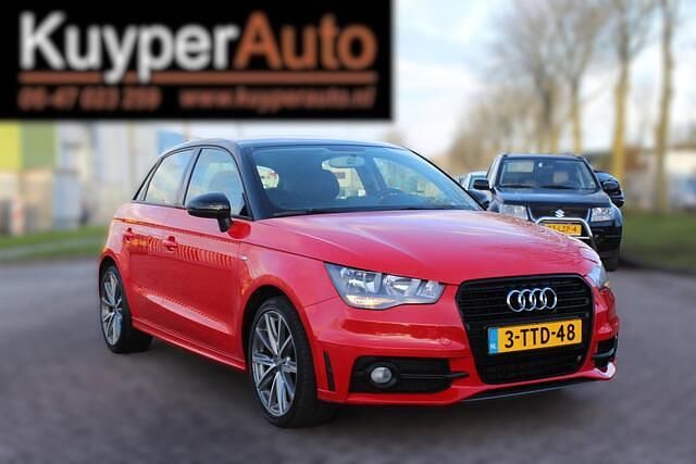 Rood (metallic) Gebruikt 2014 Audi A1 Sportback Admired Hatchback | € 8.999 (Goede deal) - Afbeelding 1/4