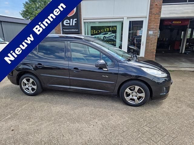 Zwart Gebruikt 2010 Peugeot 207 Stationwagen | € 2.222 (Eerlijke prijs) - Afbeelding 1/4