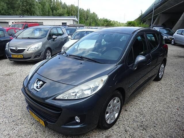 Grijs Gebruikt 2011 Peugeot 207 Access Stationwagen | € 2.495 (Eerlijke prijs) - Afbeelding 1/4