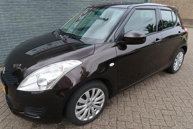 Bruin Gebruikt 2012 Suzuki Swift Hatchback | € 6.913 (Goede deal) - Afbeelding 1/4
