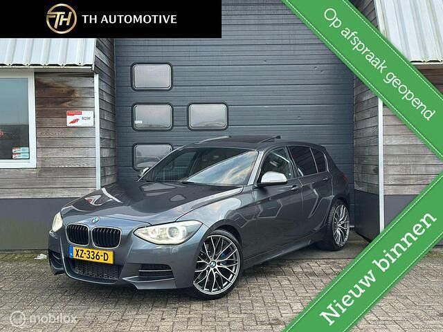 Grijs Occasion 2013 BMW M135 Executive Hatchback | € 16.795 (Iets duurder) - Afbeelding 1/4