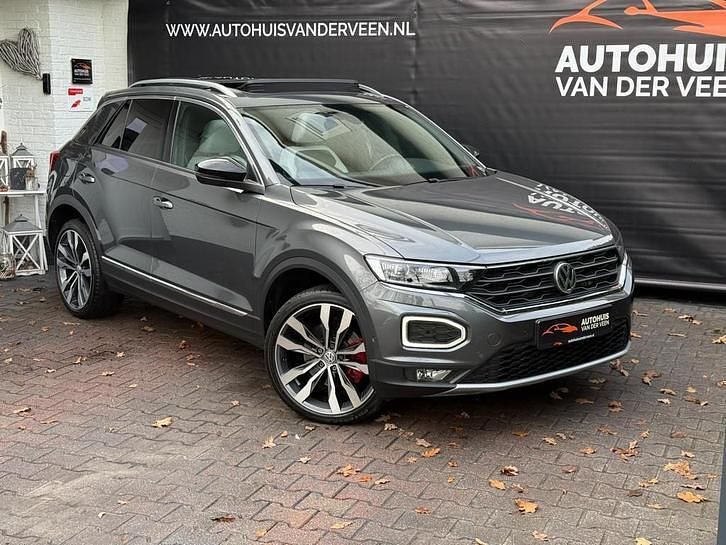 Grijs (metallic) Occasion 2018 VW T-Roc Sportline SUV | € 23.850 (Eerlijke prijs) - Afbeelding 1/4