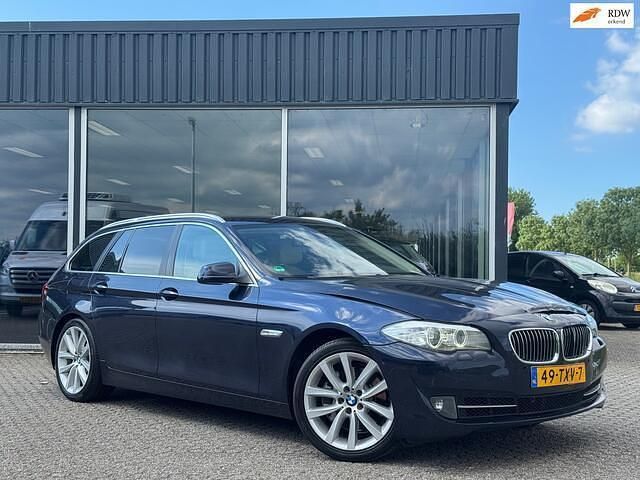 Blauw Gebruikt 2012 BMW 528 Executive Stationwagen | € 6.500 - Afbeelding 1/4