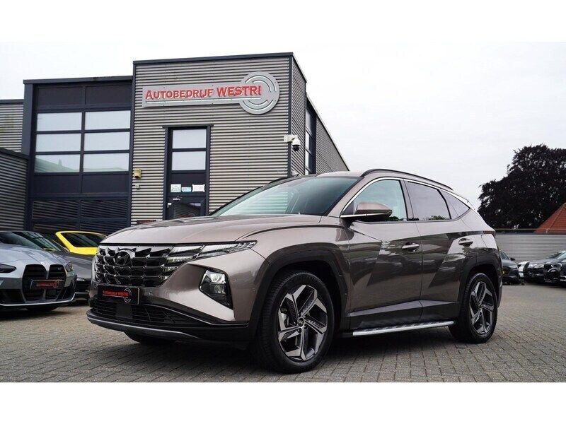 Bruin Gebruikt 2023 Hyundai Tucson Premium SUV | € 34.995 (Goede deal) - Afbeelding 1/4