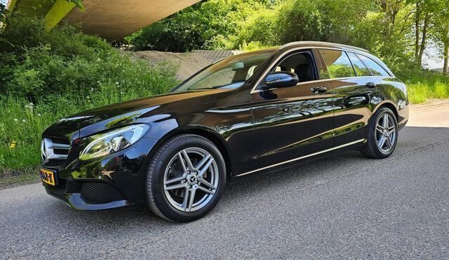 Zwart Gebruikt 2019 Mercedes C180 Stationwagen | € 13.950 (Goede deal) - Afbeelding 1/4