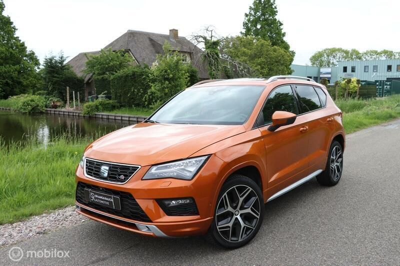 Oranje Gebruikt 2019 Seat Ateca 4Drive SUV | € 28.495 (Eerlijke prijs) - Afbeelding 1/4