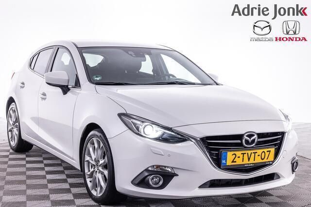 Snowflake white pearl Gebruikt 2014 Mazda 3 Hatchback | € 10.939 (Eerlijke prijs) - Afbeelding 1/4