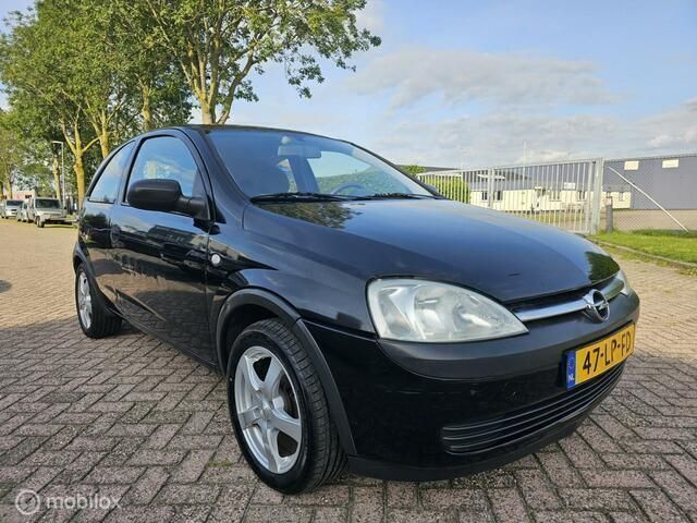 Zwart Gebruikt 2003 Opel Corsa Comfort Hatchback | € 1.199 (Eerlijke prijs) - Afbeelding 1/4