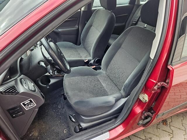 Occasion Ford Focus Ghia 101 PK (74 kW) 2000 Rood (metallic) Sedan