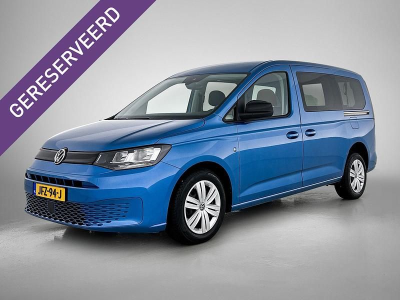 Blauw metallic Gebruikt 2021 VW Caddy Maxi Life MPV | € 44.950 - Afbeelding 1/3