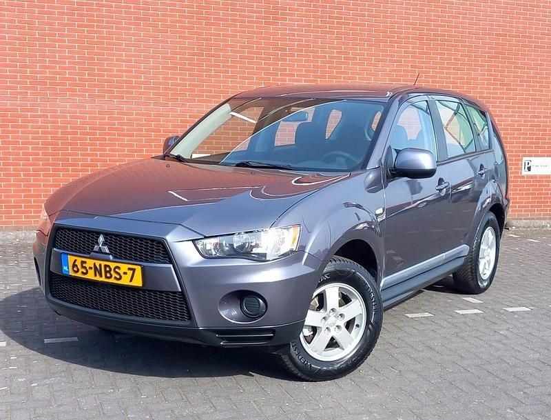 Bruin Gebruikt 2010 Mitsubishi Outlander Invite SUV | € 4.950 (Duur) - Afbeelding 1/4