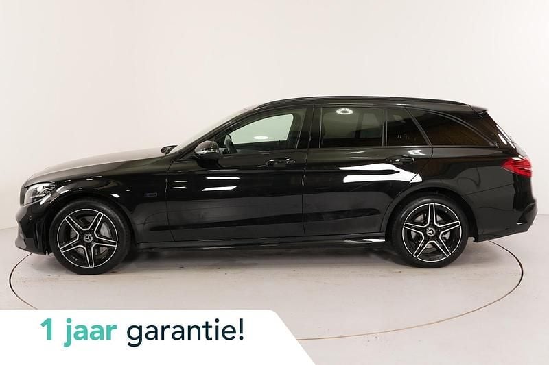 Zwart (metallic) Gebruikt 2020 Mercedes C300 AMG Stationwagen | € 29.500 (Goede deal) - Afbeelding 1/4