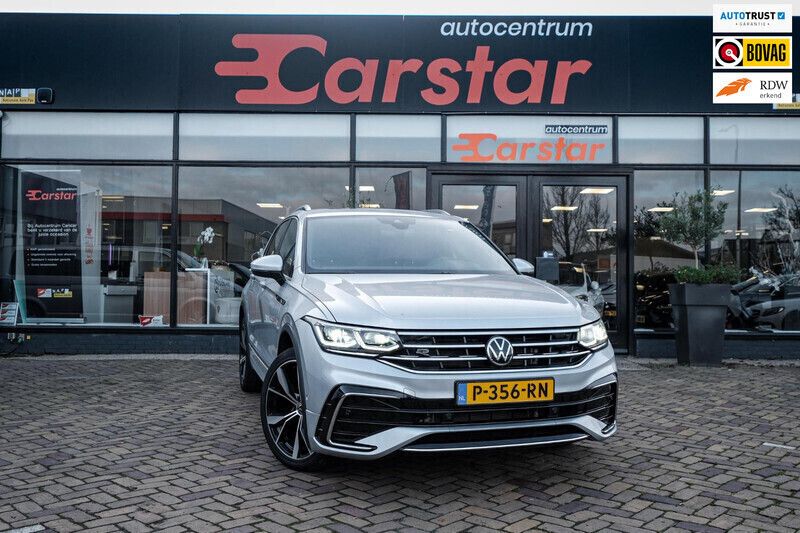 Grijs, metallic lak Gebruikt 2022 VW Tiguan Business+ SUV | € 39.850 (Iets duurder) - Afbeelding 1/4