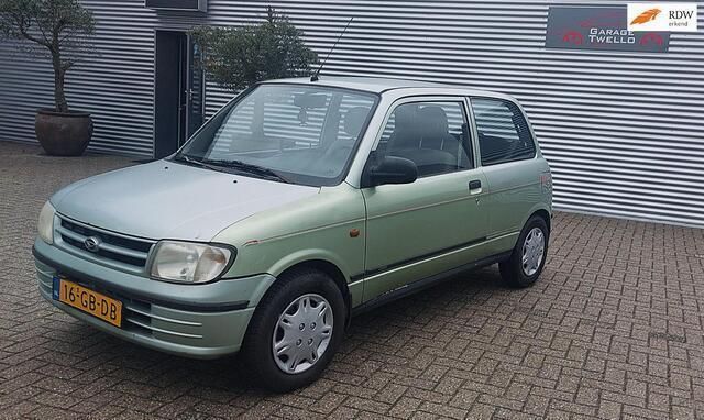 Groen Gebruikt 2000 Daihatsu Cuore Hatchback | € 1.250 (Eerlijke prijs) - Afbeelding 1/4