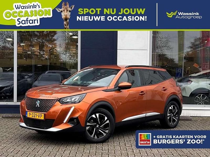 Oranje Gebruikt 2021 Peugeot e-2008 Allure SUV | € 17.440 (Goede deal) - Afbeelding 1/3