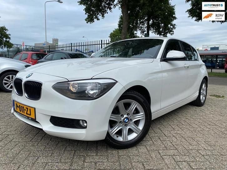 Wit Gebruikt 2014 BMW 114 Hatchback | € 7.999 (Eerlijke prijs) - Afbeelding 1/4