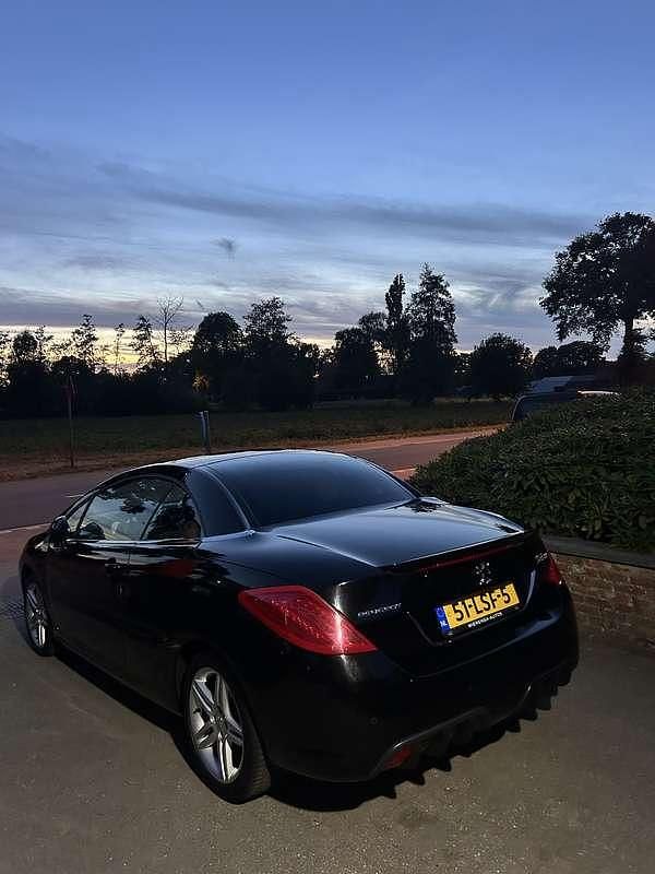 Zwart Gebruikt 2010 Peugeot 308 CC Sport Cabriolet | € 4.500 (Goede deal) - Afbeelding 1/4