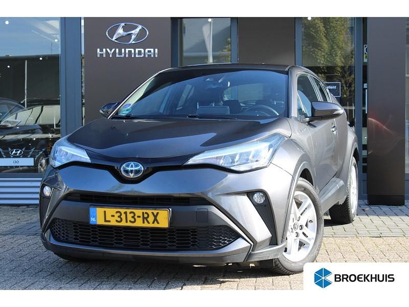 Grijs Gebruikt 2021 Toyota C-HR Active SUV | € 18.400 (Goede deal) - Afbeelding 1/4