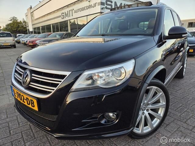 Zwart, metallic lak Gebruikt 2009 VW Tiguan Track & Field SUV | € 9.950 (Eerlijke prijs) - Afbeelding 1/4