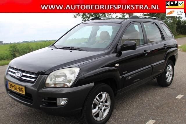 Zwart (metallic) Gebruikt 2006 Kia Sportage SUV | € 2.950 (Goede deal) - Afbeelding 1/4