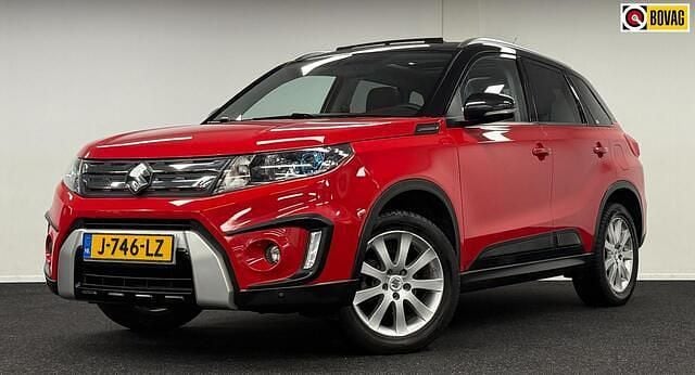 Rood (metallic) Occasion 2015 Suzuki Vitara SUV | € 12.995 (Eerlijke prijs) - Afbeelding 1/3
