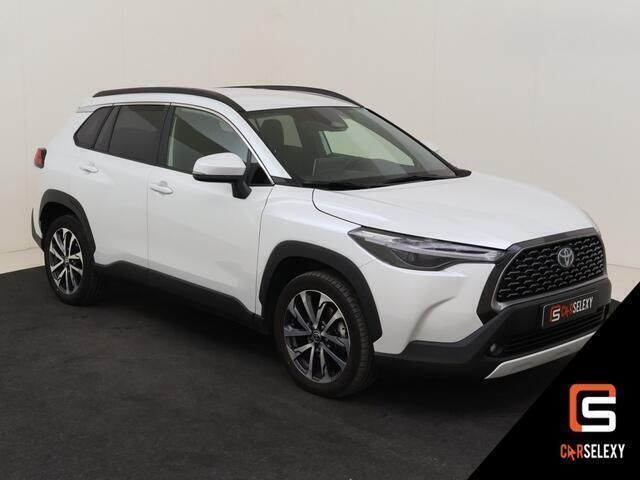 Wit Gebruikt 2024 Toyota Corolla Hybrid Style MPV | € 36.990 (Super prijs) - Afbeelding 1/4