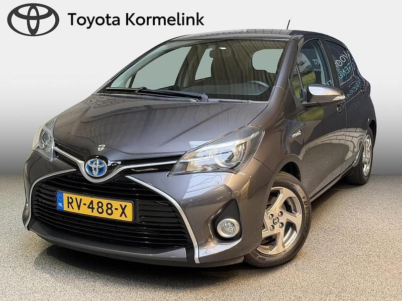 Grijs Gebruikt 2017 Toyota Yaris Hybrid Trend Hatchback | € 16.750 (Eerlijke prijs) - Afbeelding 1/4