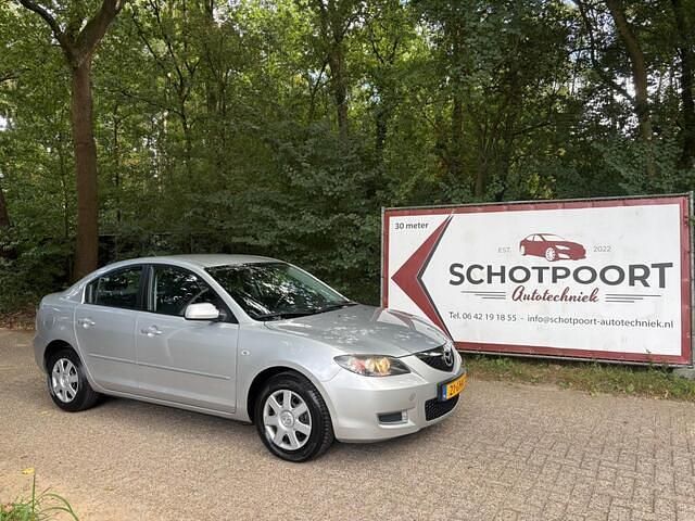 Grijs, andere lak Gebruikt 2008 Mazda 3 Touring Sedan | € 3.750 (Eerlijke prijs) - Afbeelding 1/4