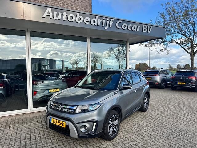 Grijs Gebruikt 2016 Suzuki Vitara SUV | € 15.950 (Eerlijke prijs) - Afbeelding 1/4