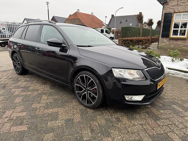 Occasion Skoda Octavia Ambition 105 PK (77 kW) 2014 Zwart Stationwagen