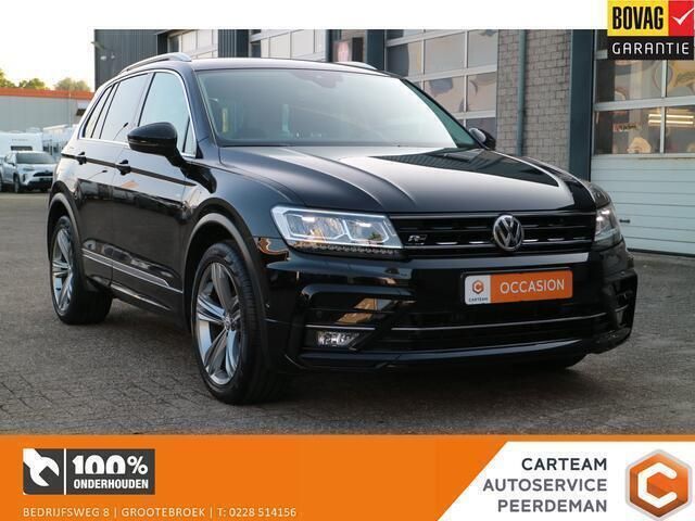 Zwart Gebruikt 2018 VW Tiguan R-line SUV | € 25.450 (Goede deal) - Afbeelding 1/4