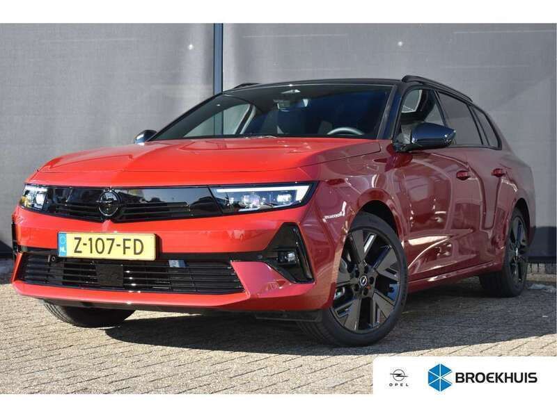 Rood, metallic lak Gebruikt 2024 Opel Astra Stationwagen | € 27.450 (Eerlijke prijs) - Afbeelding 1/4