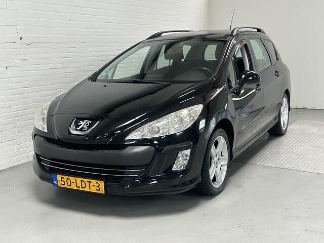 Zwart Gebruikt 2010 Peugeot 308 SW Stationwagen | € 1.999 - Afbeelding 1/4