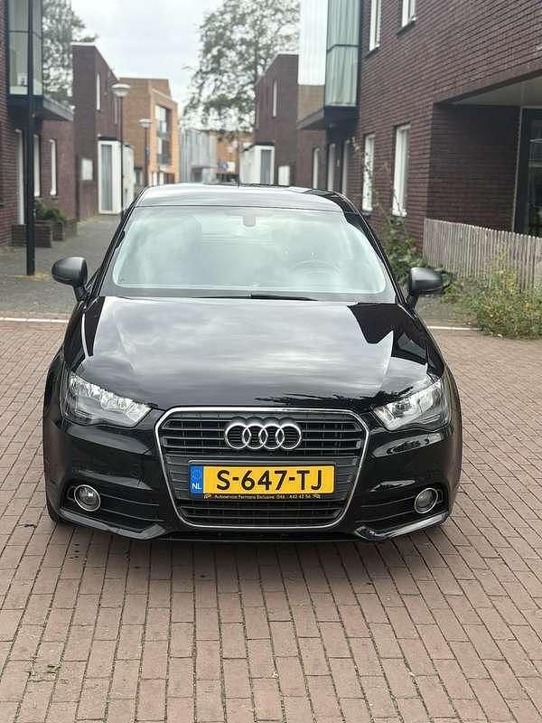 Zwart Gebruikt 2010 Audi A1 Ambition Hatchback | € 8.250 (Goede deal) - Afbeelding 1/4